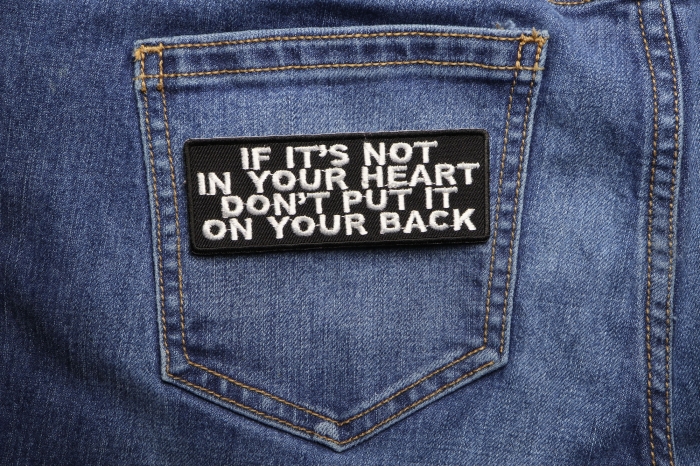If It's Not In Your Heart Don't Put It On Your Back Patch shown on jeans