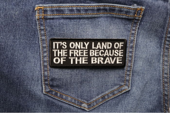 It's Only Land Of The Free Because Of The Brave Patch shown on jeans