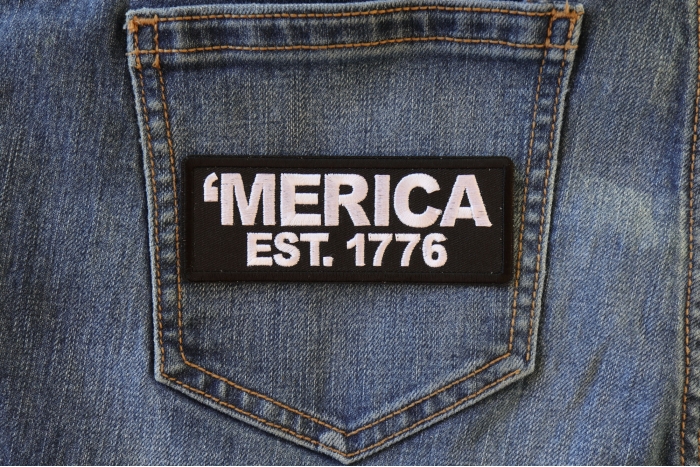 Merica Est 1776 Patriotic Iron on Patch shown on jeans