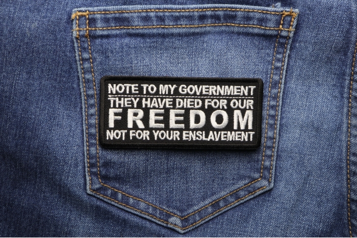 Note To My Government, They Have Died For Our Freedom, Not For Your Enslavement Patriotic Iron on Patch shown on jeans