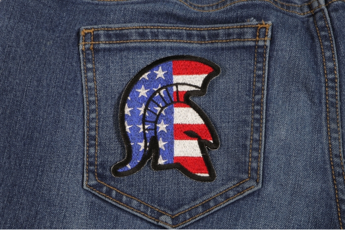 Spartan Helmet With US Flag Patriotic Iron on Patch shown on jeans
