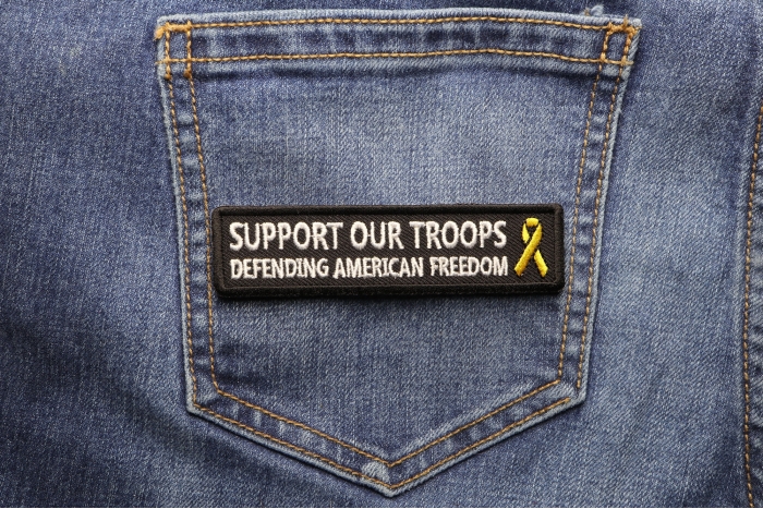 Support Our Troops Defending American Freedom Patriotic Iron on Patch shown on jeans