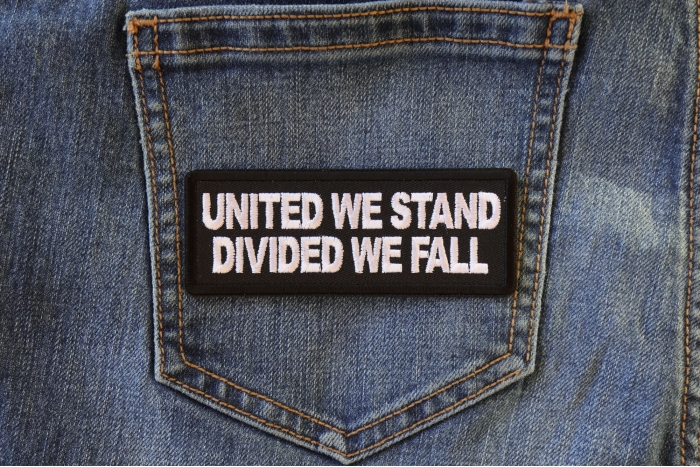United We Stand Divided We Fall Patch shown on jeans