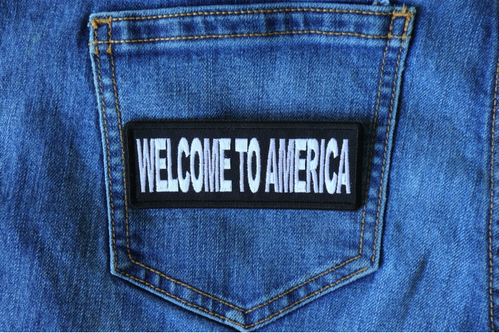 Welcome To America Patriotic Iron on Patch shown on jeans