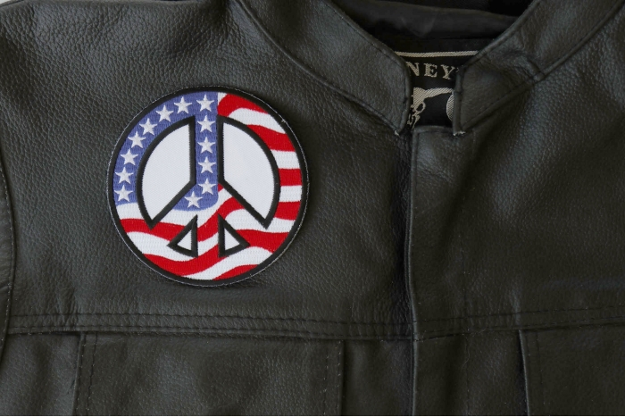 American Flag Peace Sign Patch - 4x4 inch - Embroidered Iron on Patch shown on leather vest
