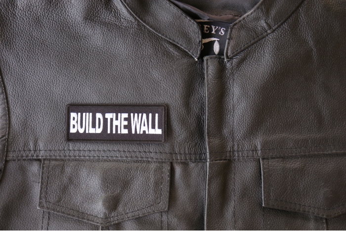 Build The Wall Patch, Patriotic Saying Patches shown on leather vest