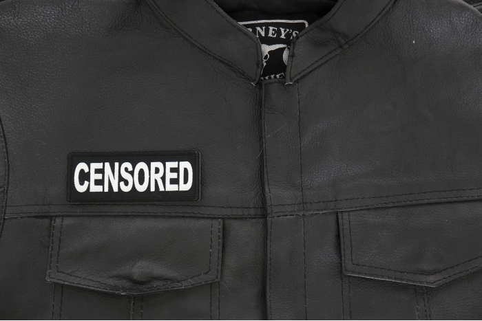 Censored Patch - 4x1.5 inch - Embroidered Iron on Patch shown on leather vest