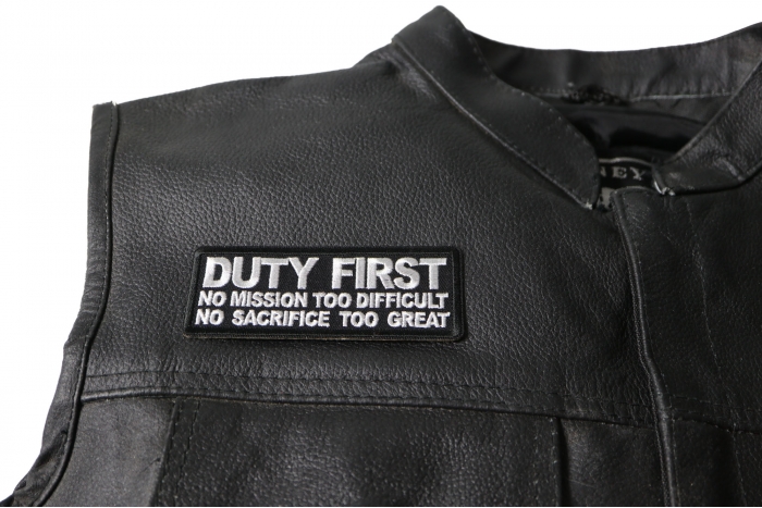 Duty First No Mission Too Difficult no Sacrifice Too Great Patch - 4x1.5 inch. Embroidered Iron on Patch shown on leather vest