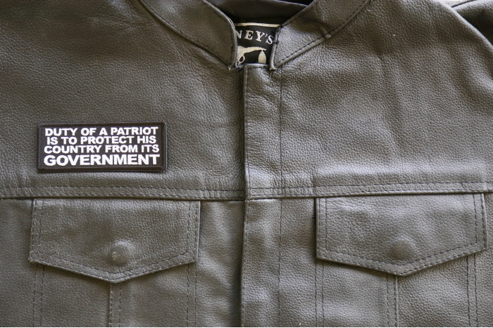 Duty of a Patriot is to Protect his Country from Its Government Patch, Patriotic Patches, Iron on Quotes and Sayings for Hats shown on leather vest