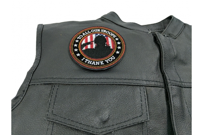 I Thank You To All Our Troops Round Patch - By Ivamis Trading - 3.75x3.75 inch - Embroidered Iron on Patch shown on leather vest