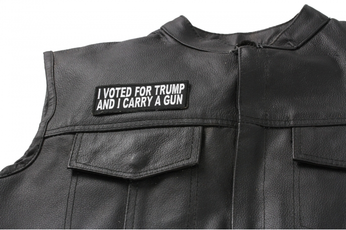 I Voted for Trump and I Carry a Gun Patch - 4x1.5 inch. Embroidered Iron on Patch shown on leather vest