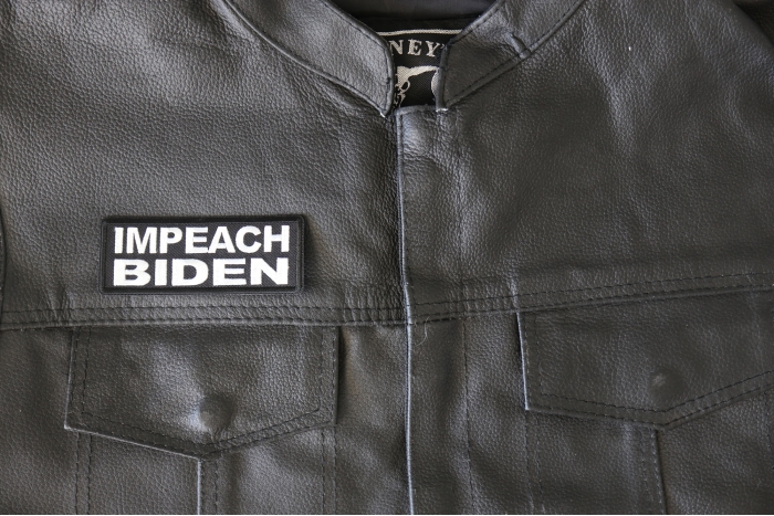 Impeach Biden Patch - 4x1.5 inch - Embroidered Iron on Patch shown on leather vest