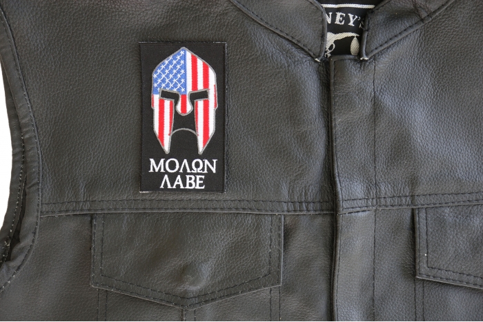 Molon Labe Spartan Patch With US Flag - 2.3x4 inch. Embroidered Iron on Patch shown on leather vest