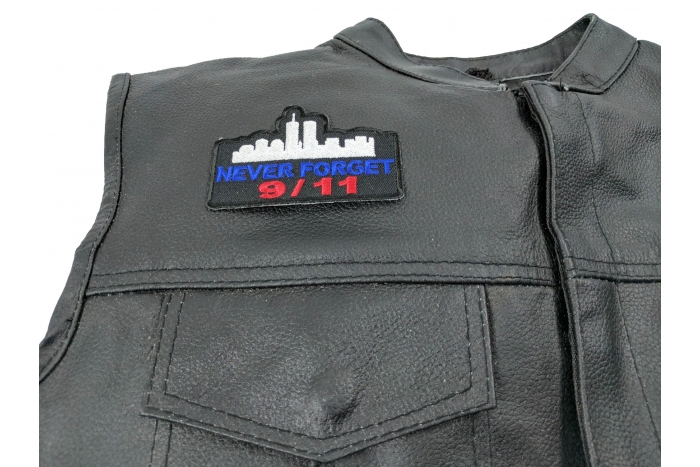 Never Forget 9 11 Patch - 3.25x1.5 inch. Embroidered Iron on Patch shown on leather vest
