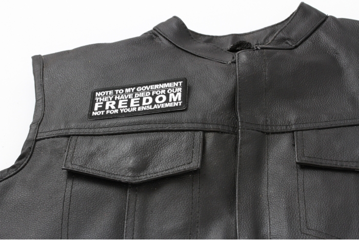 Note To My Government, They Have Died For Our Freedom, Not For Your Enslavement Patch - 4x1.75 inch. Embroidered Iron on Patch shown on leather vest