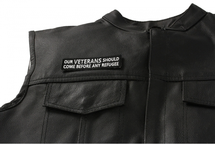 Our Veterans Should Come Before Any Refugee Patch, Military Saying Patches shown on leather vest