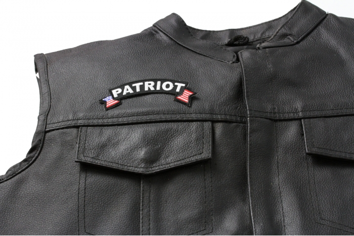 Patriot Rocker Patch With US Flag - 4x1.5 inch. Embroidered Iron on Patch shown on leather vest
