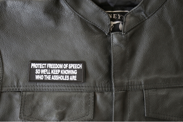 Protect Freedom of Speech so We'll Keep Knowing Who the Assholes Are Patch, Funny Saying Patches shown on leather vest