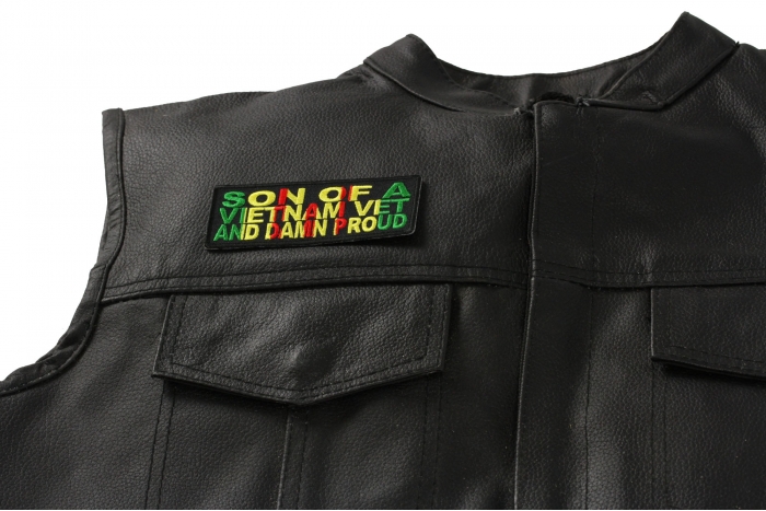 Son Of A Vietnam Vet and Damn Proud Patch - 4x1.5 inch. Embroidered Iron on Patch shown on leather vest