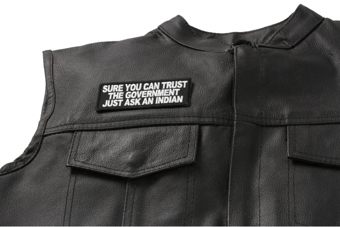 Sure You Can Trust The Government Patch - 4x1.5 inch. Embroidered Iron on Patch shown on leather vest