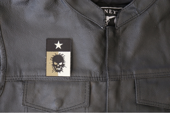 Texas Flag Oil Spill Skull Patch, Skull Patches shown on leather vest