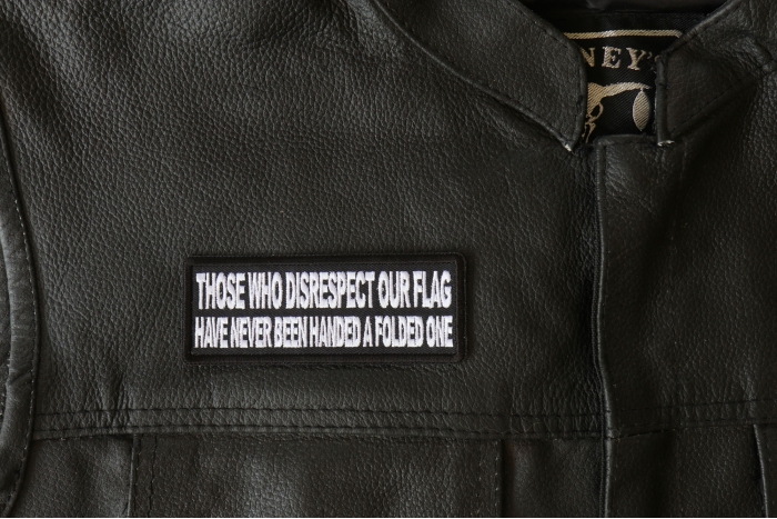 Those Who Disrespect Our Flag Have Never Been Handed a Folded One Patch, Patriotic Patches, Iron on Quotes and Sayings for Hats shown on leather vest