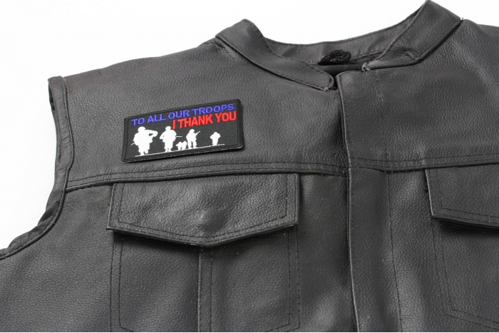 To All Our Troops I Thank You Patch - 3.5x2 inch. Embroidered Iron on Patch shown on leather vest