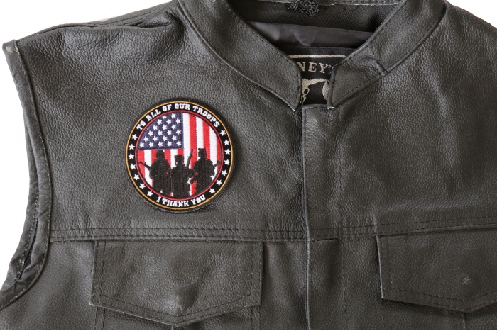 to All Our Troops I Thank You Patch - 3.5x3.5 inch. Embroidered Iron on Patch shown on leather vest
