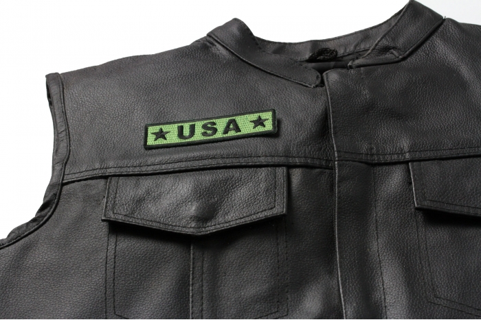 USA Black and Green Patch - Iron on Patch - 4x1 inch shown on leather vest