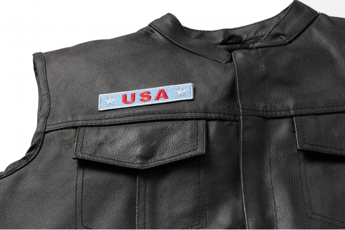 USA Light Blue Patch - Iron on Patch - 4x1 inch shown on leather vest