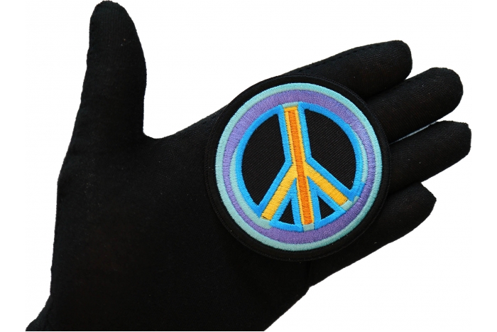 Peace Arrow Patch, Hippie Patches shown on hand for size comparison