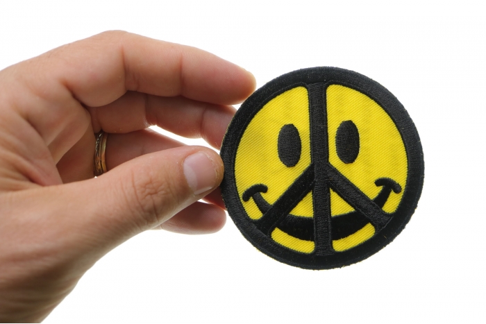  shown on hand for size comparison