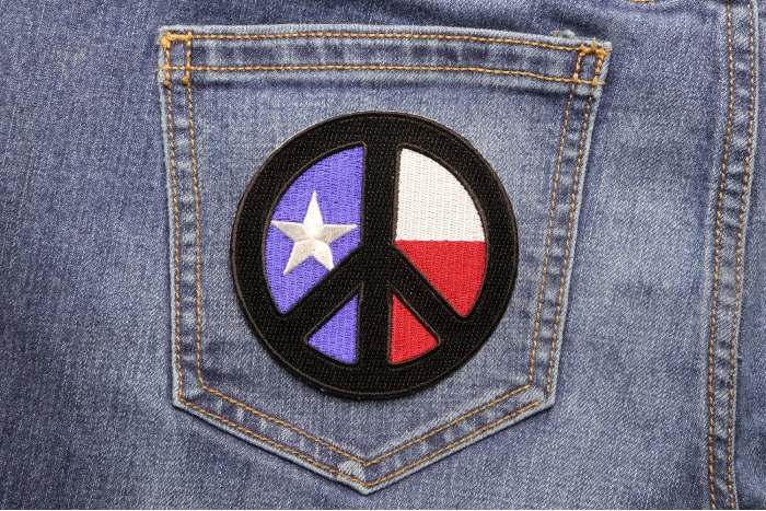 Black Texas Peace Patch shown on jeans