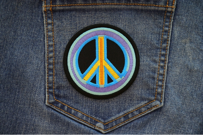 Peace Arrow Patch shown on jeans