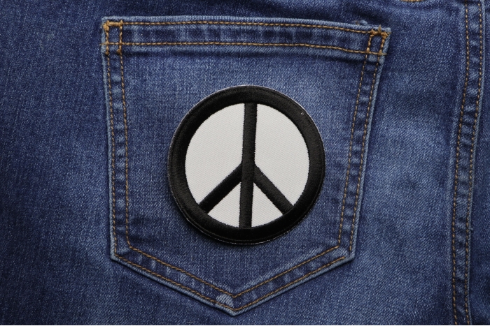Peace Sign Patch Black On White shown on jeans