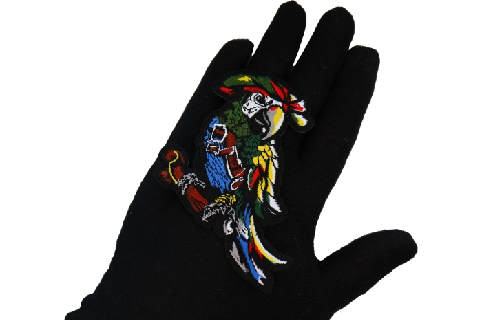 Pirate Parrot Patch shown on hand for size comparison