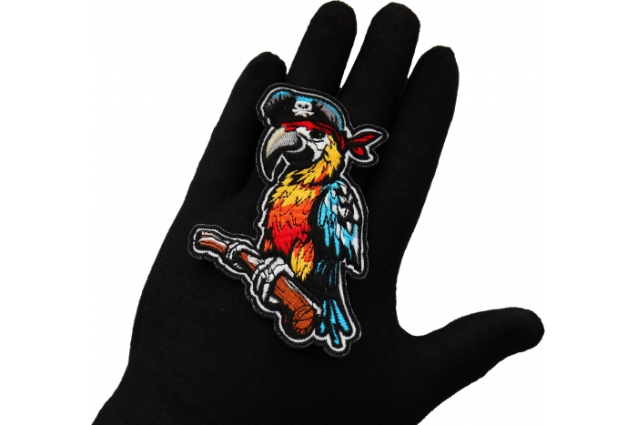 Pirate Parrot Patch shown on hand for size comparison