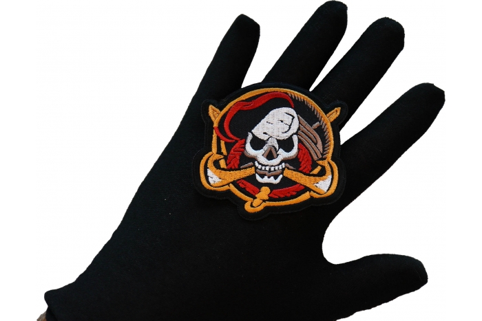 Skull Pirate Patch, Skull Patches shown on hand for size comparison