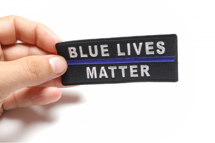 Blue Lives Matter Patch with Blue Line shown on hand for size comparison