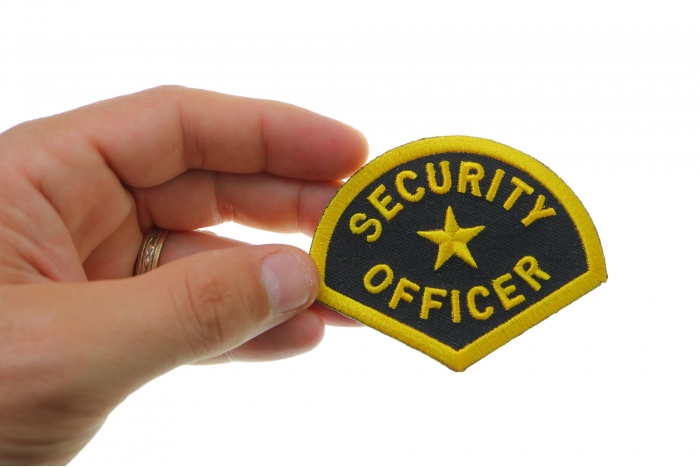 Security Officer Name Tag Patch shown on hand for size comparison