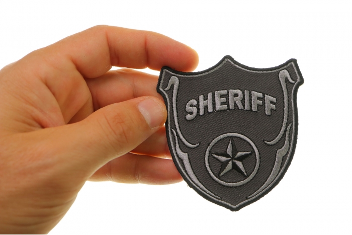  shown on hand for size comparison