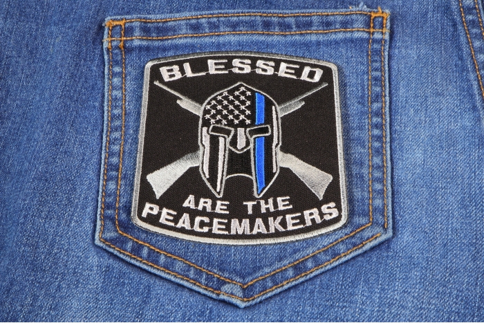 Blessed Are The Peacemakers Thin Blue Line Patch For Law Enforcement shown on jeans