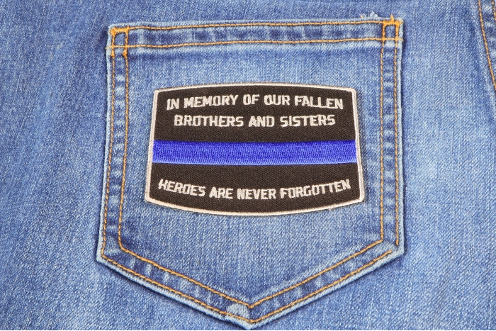 Fallen Officer Memorial Blue Line Patch shown on jeans