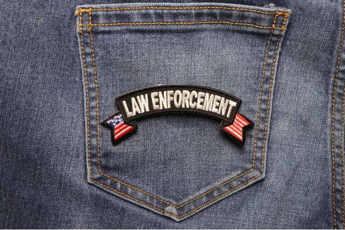 Law Enforcement US Flag Small Rocker Patch shown on jeans