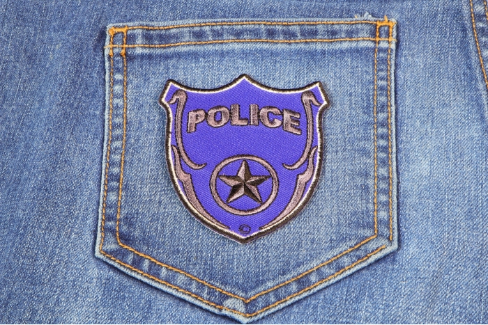 Police Shield Patch shown on jeans