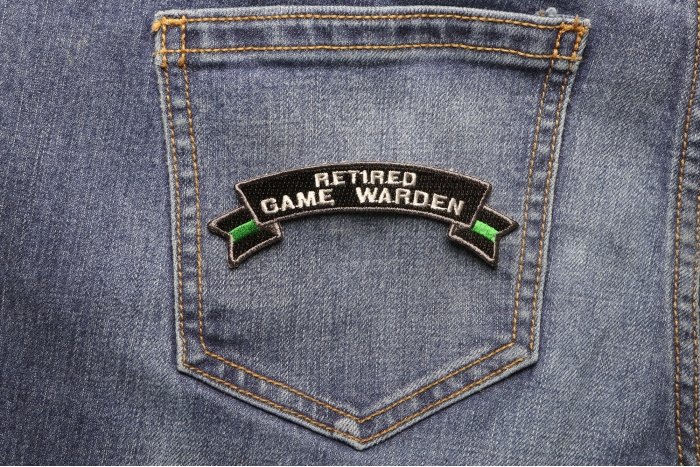 Retired Game Warden Rocker Patch shown on jeans