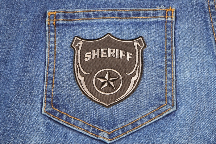 Sheriff Patch In Silver and Gray shown on jeans