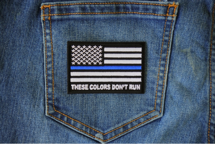 Blue Stripe American Flag Patch - These Colors Don't Run - for Jackets and Vests shown on jeans