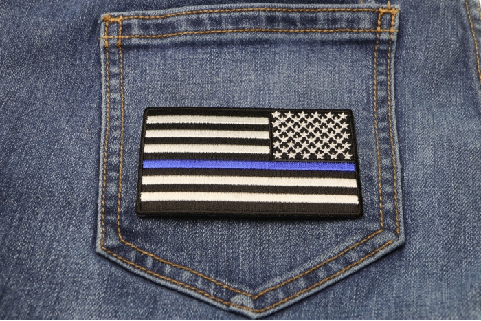 Thin Blue Line American Flag Reversed Patch shown on jeans