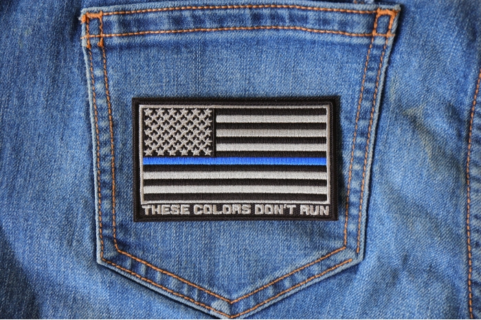 Thin Blue Line American Flag These Colors Don't Run Patch shown on jeans